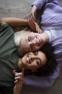 beautiful lesbian couple being affectionate home